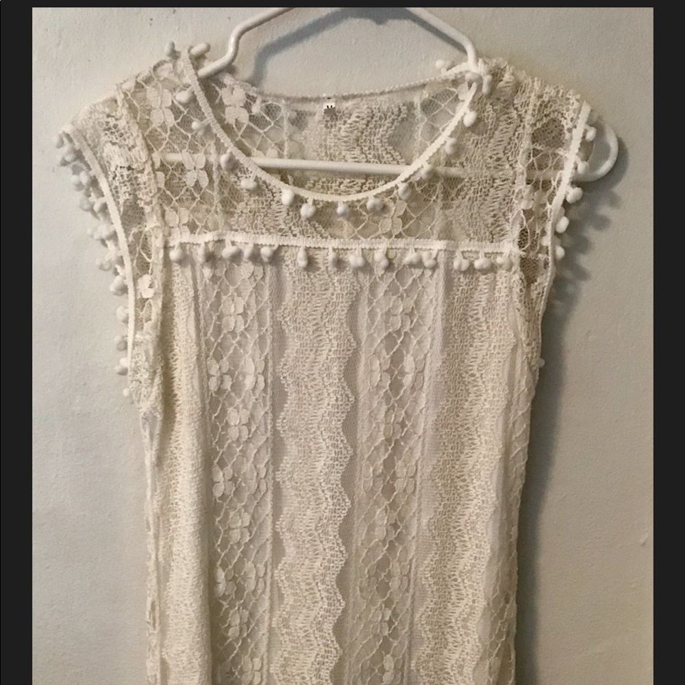 Womans cream toned lace dress